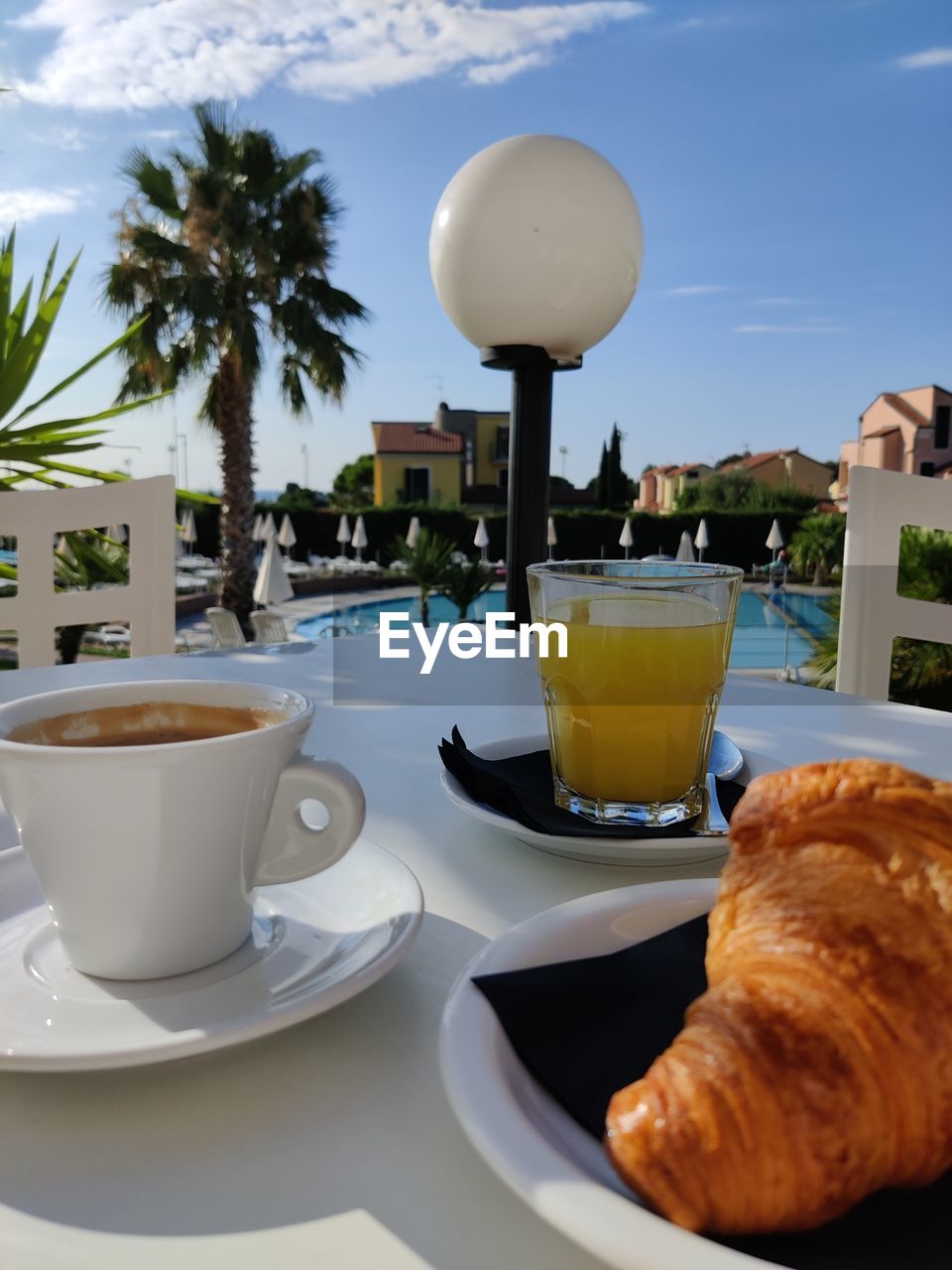 CLOSE-UP OF COFFEE SERVED ON TABLE WITH DRINK