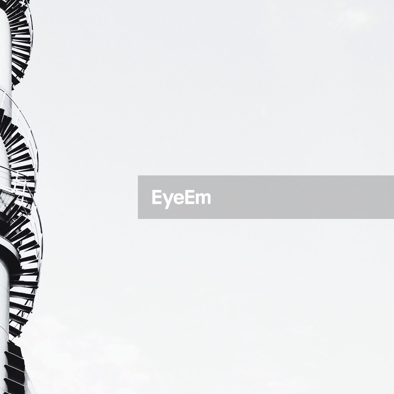 Low angle view of spiral staircase against clear sky