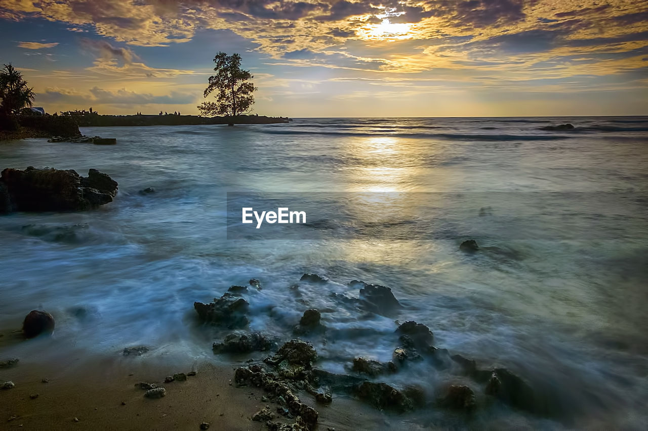 Scenic view of sea against sky during sunset