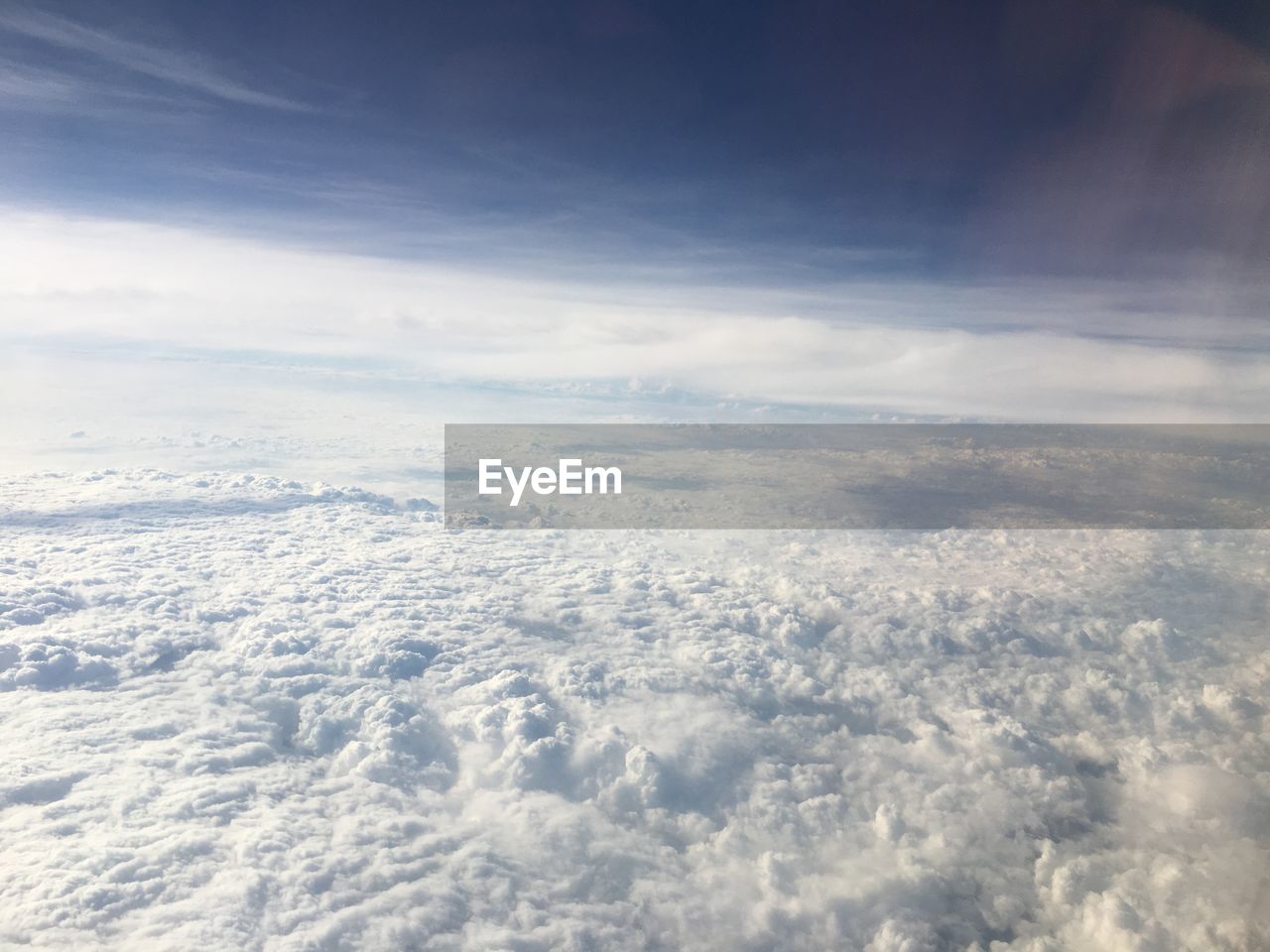 AERIAL VIEW OF CLOUDS OVER SEA