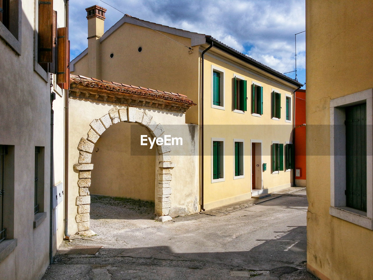 Footpath amidst houses at cordignano