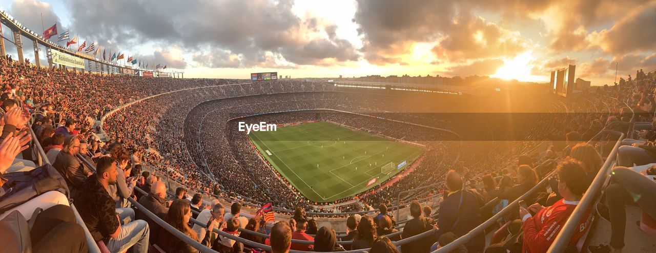 HIGH ANGLE VIEW OF PEOPLE ON SOCCER FIELD