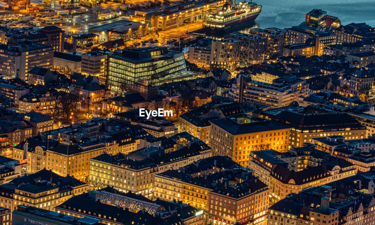 High angle view of illuminated buildings at night