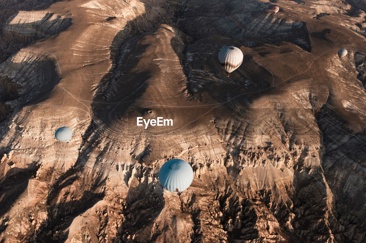 HIGH ANGLE VIEW OF ROCK FORMATIONS IN A PARK