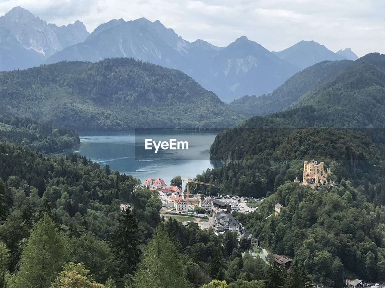 High angle view of townscape by mountains