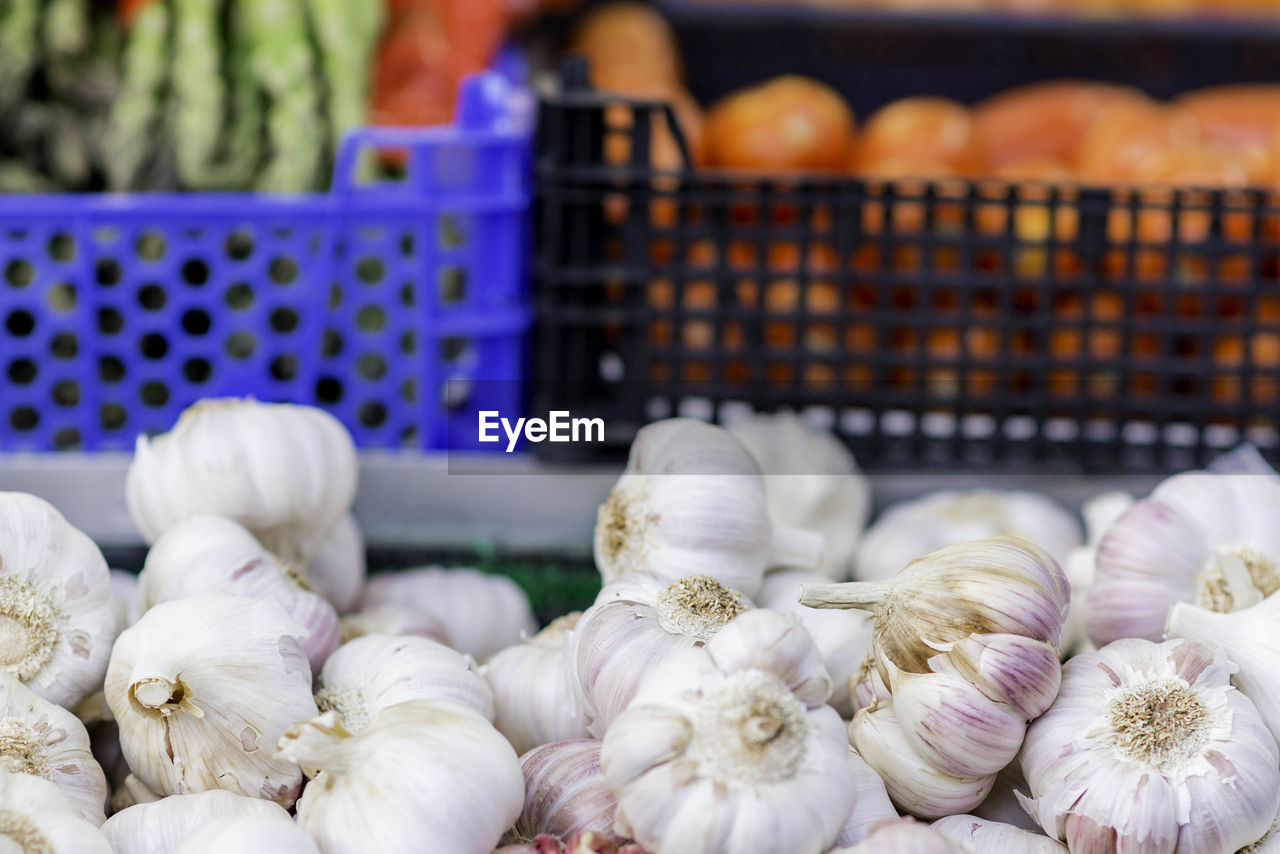 Close-up of garlics for sale in market