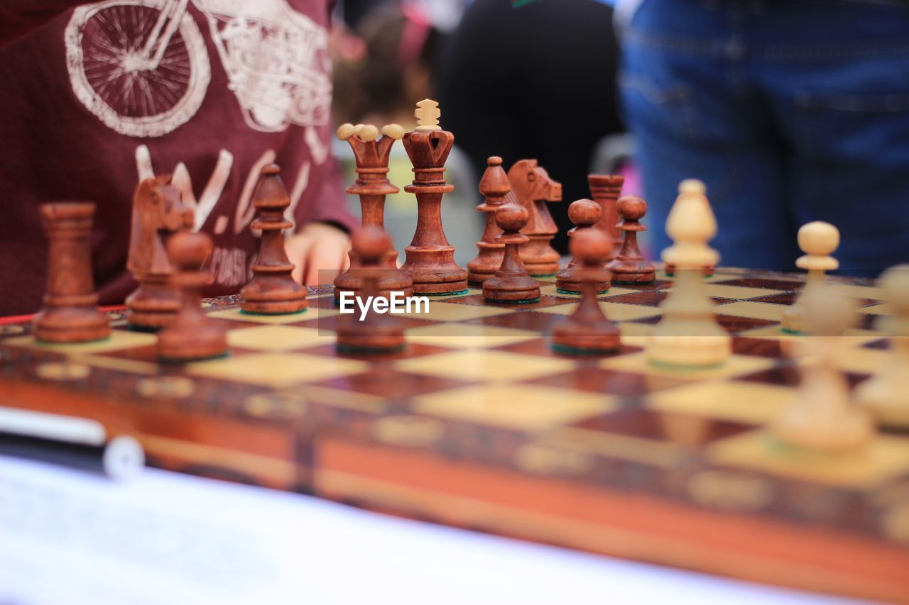 Close-up of chess pieces on board