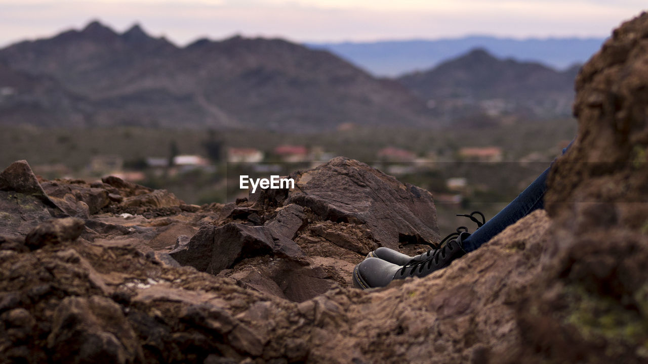 Close-up of rock against sky