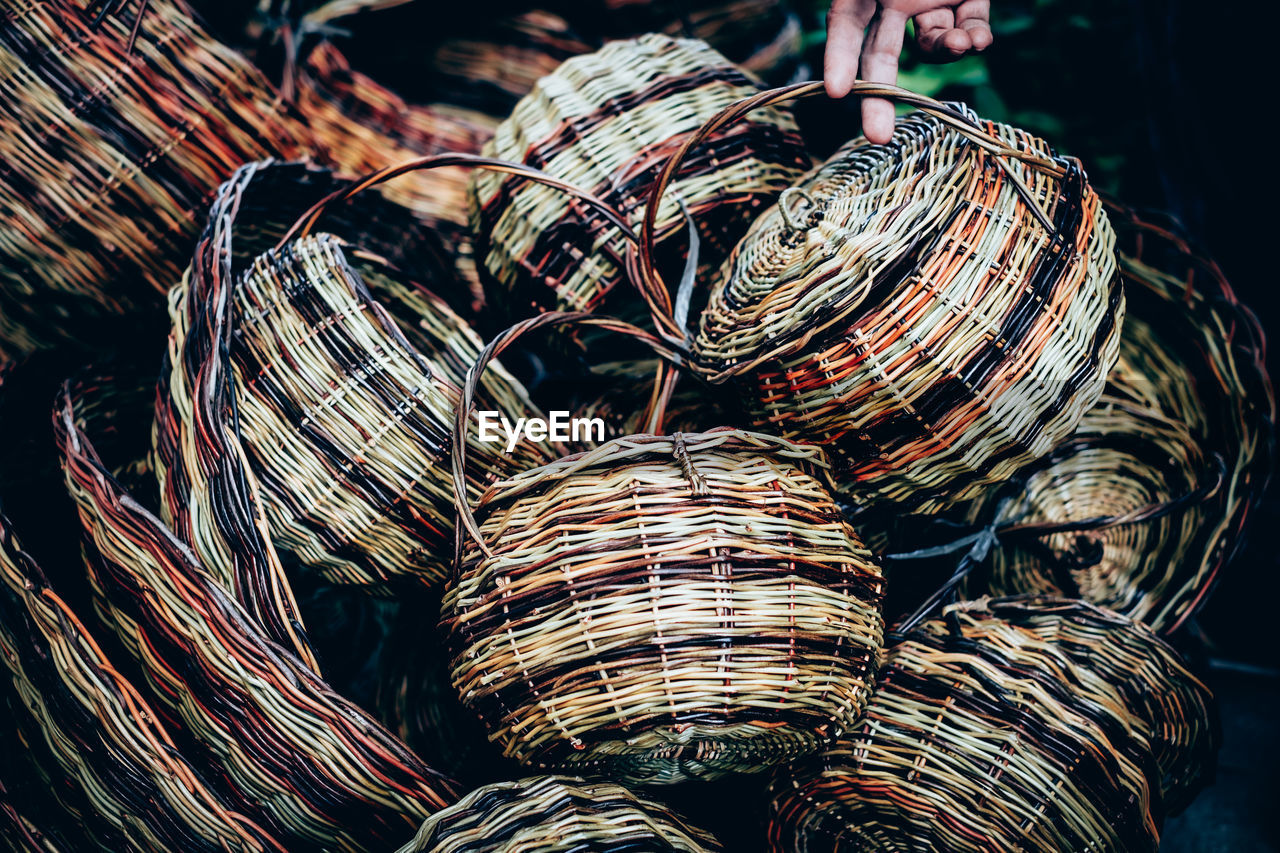 Close-up of baskets for sale in market