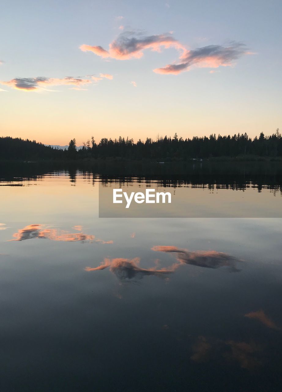 SCENIC VIEW OF LAKE DURING SUNSET