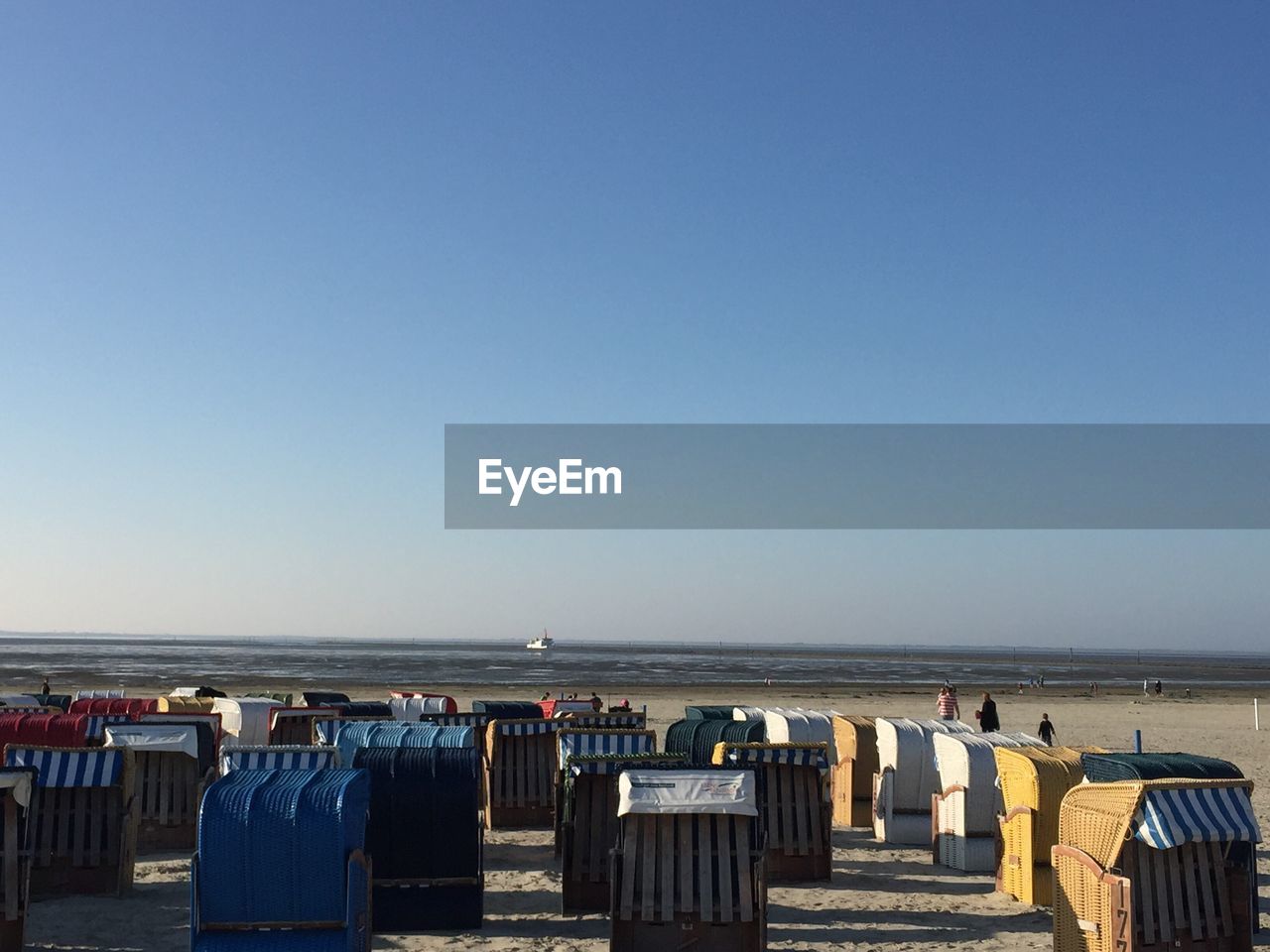 Scenic view of beach against clear sky