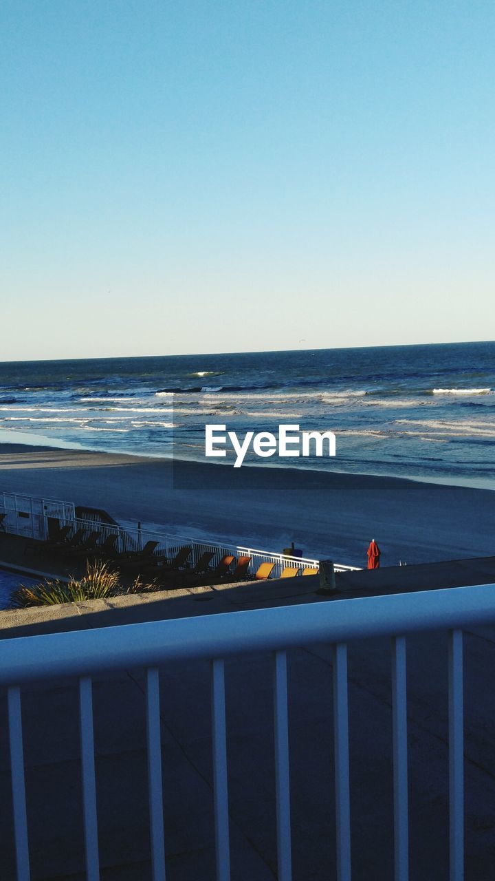 SCENIC VIEW OF BEACH AGAINST CLEAR SKY