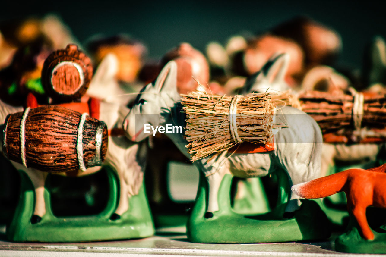 Close-up of souvenirs for sale in market