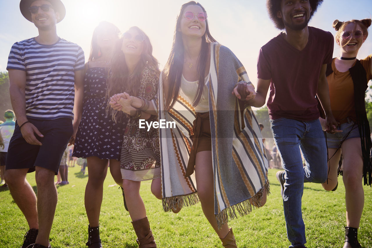 Group of people at party during sunny day