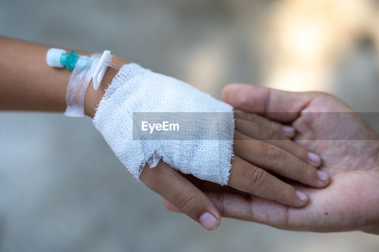 Close-up of hand with bandage