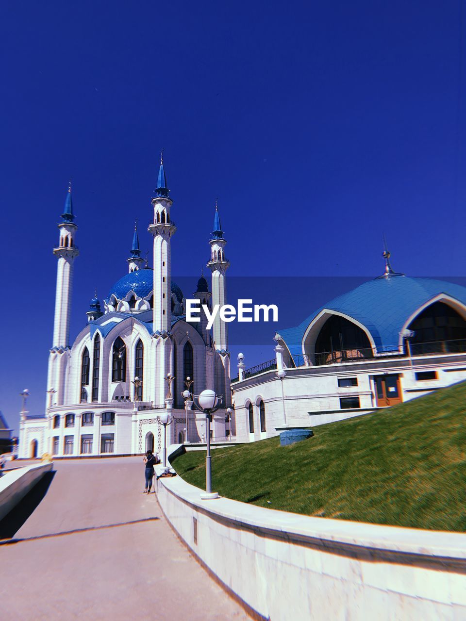 VIEW OF CHURCH AGAINST BUILDINGS