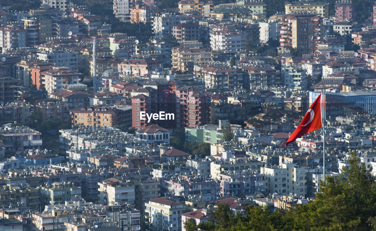 High angle view of turkish flag against cityscape