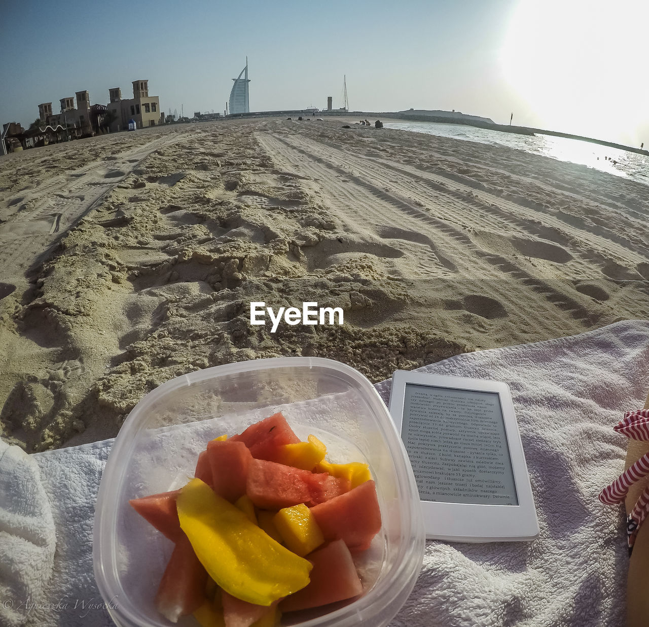 Close-up of fruits on sand