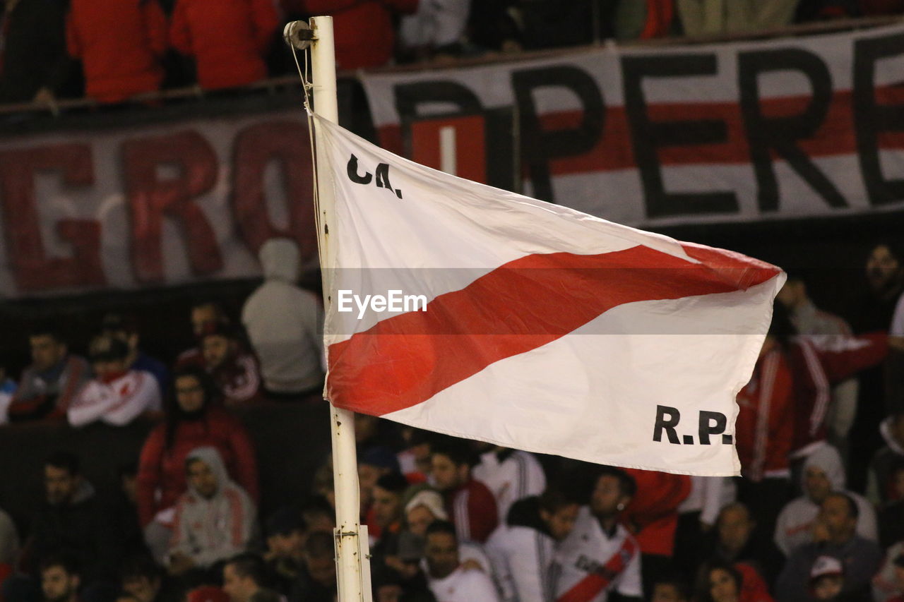 CLOSE-UP OF FLAGS AGAINST FLAG