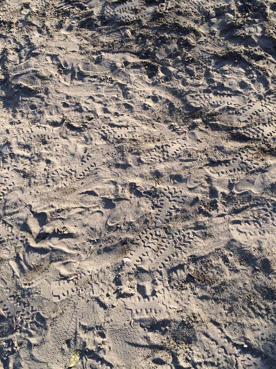 Shoe prints on sand