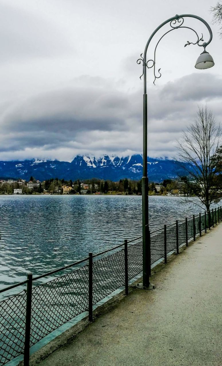 SCENIC VIEW OF LAKE AGAINST MOUNTAINS