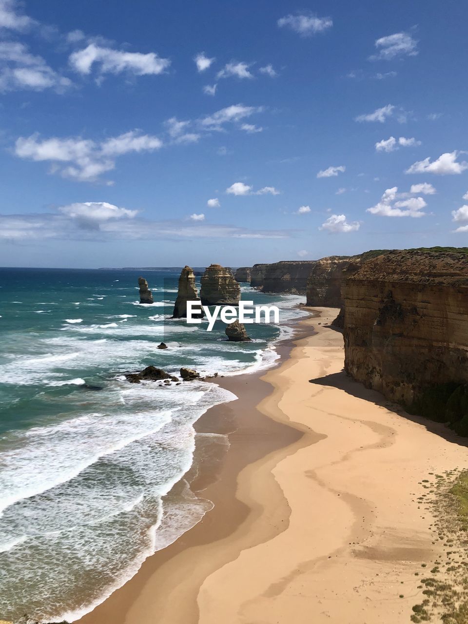 Scenic view of beach against sky