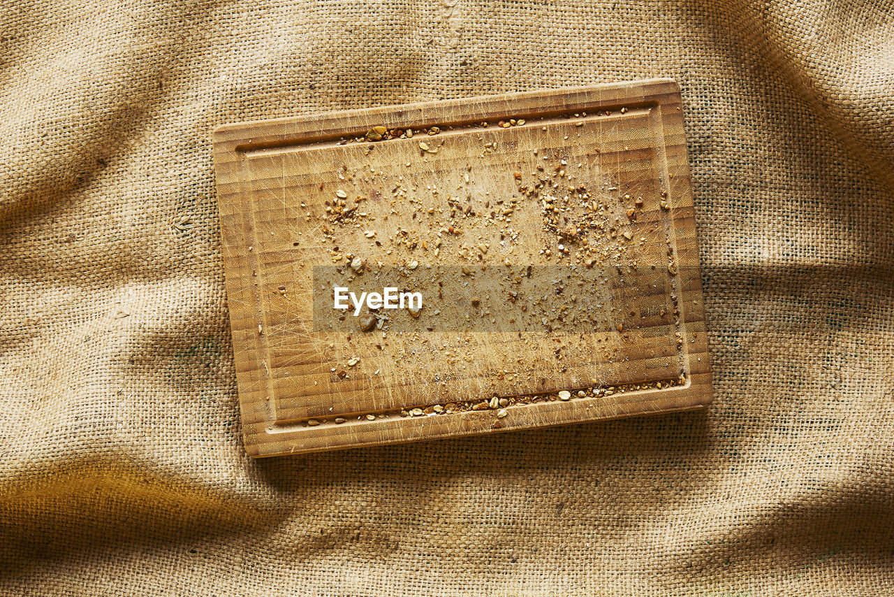 Directly above shot of cutting board on sack