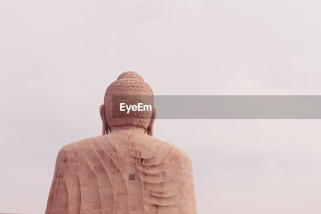 Giant buddha statue from different angles