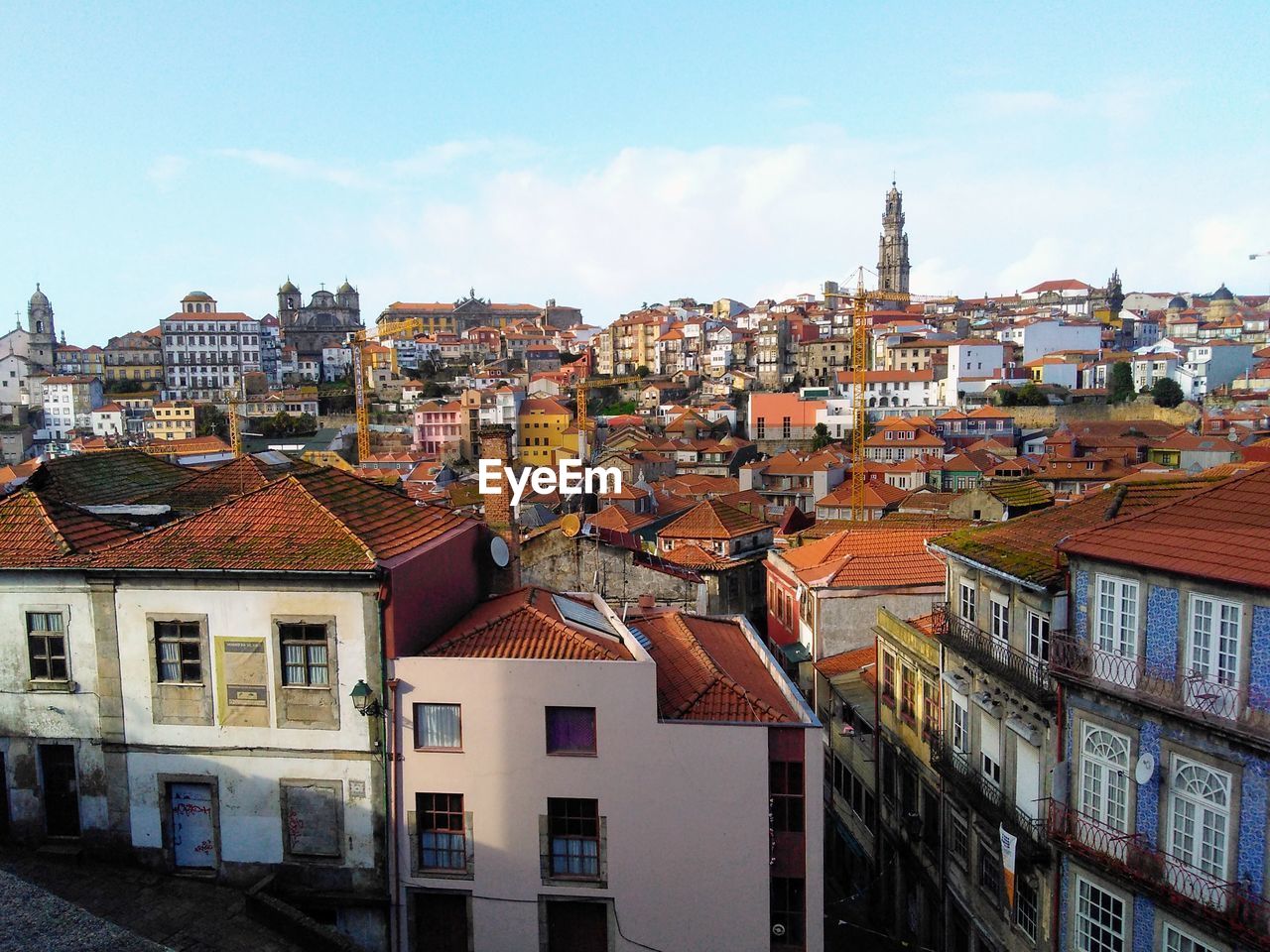 An aerial view of the red roofed buildings of an old town