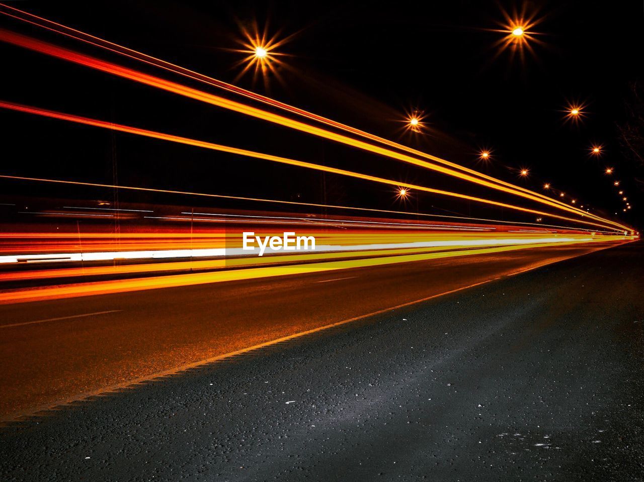 Light trails on road at night