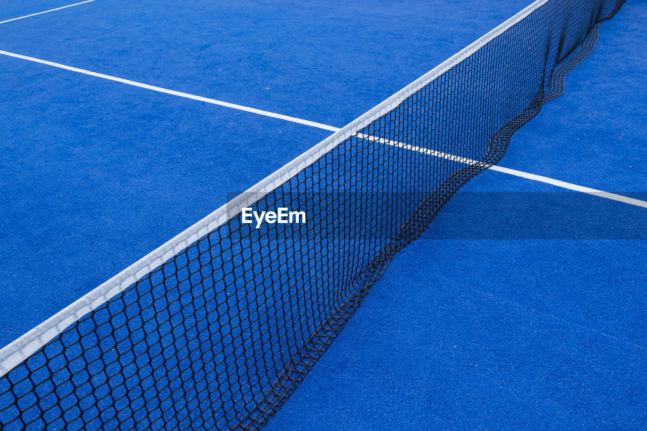 Service line and the net of a paddle tennis court
