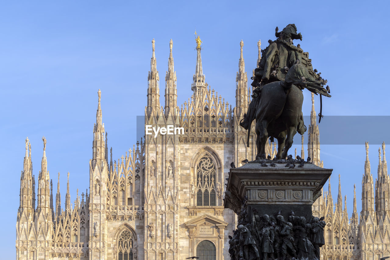 Vittorio emanuele ii statue infront of the cathedral in milano