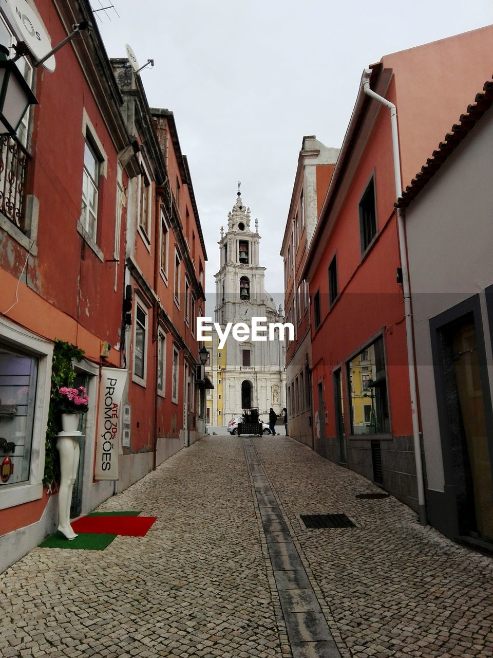 Cobbled street amidst buildings