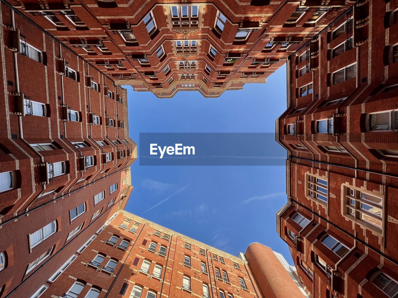 Low angle view of buildings against clear sky