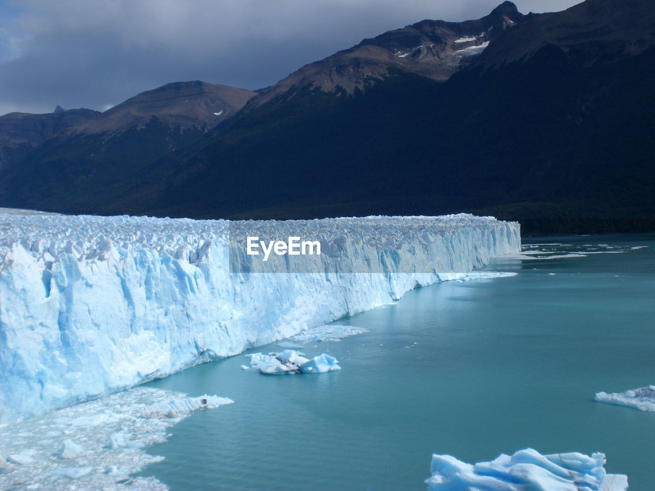 SCENIC VIEW OF FROZEN LAKE