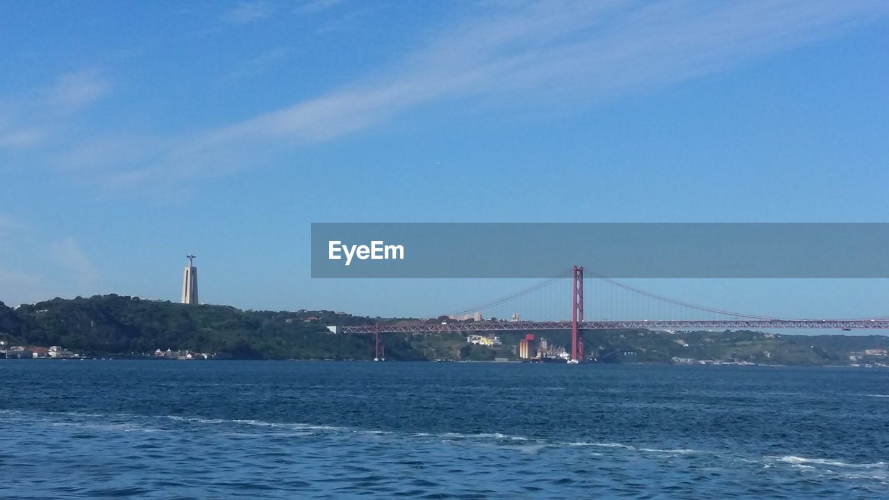 VIEW OF SUSPENSION BRIDGE IN CITY