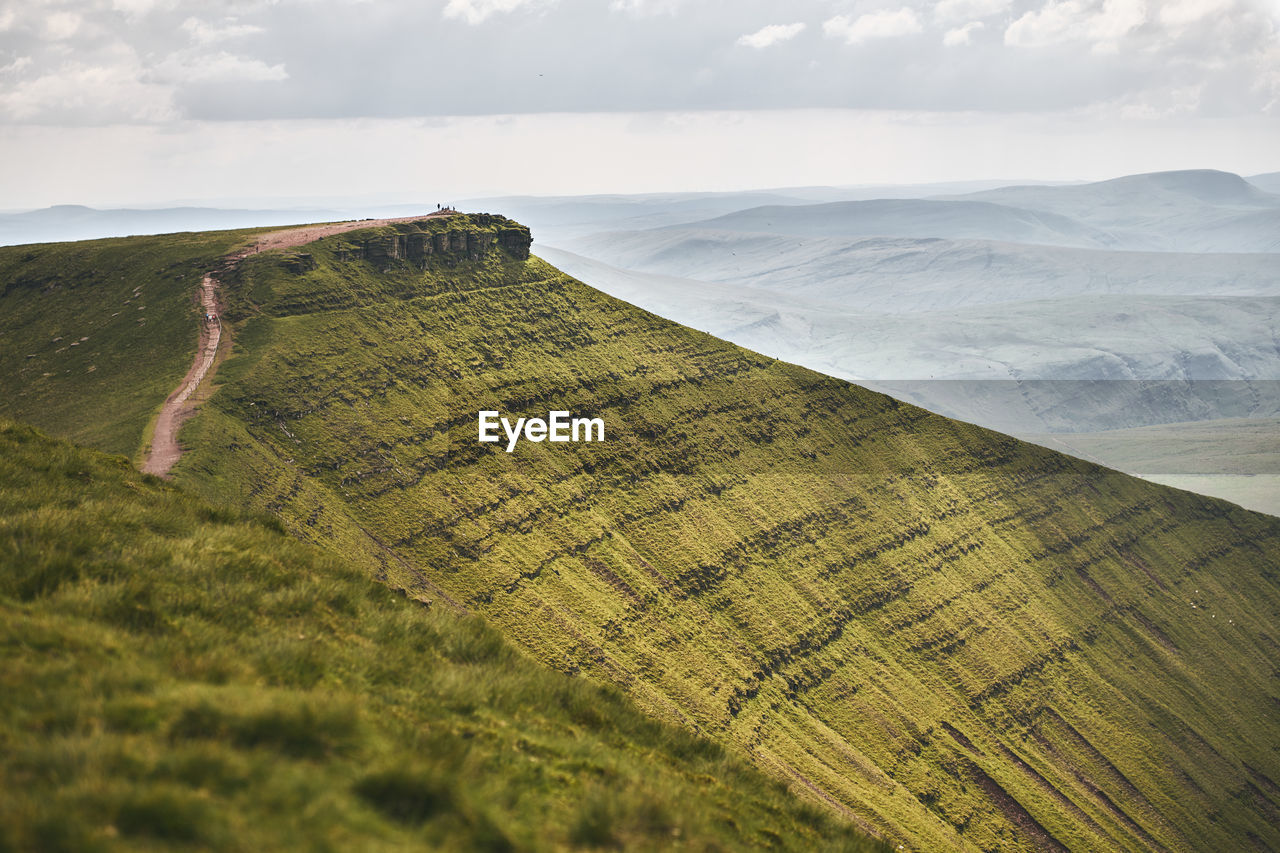 Scenic view of mountain peak against sky