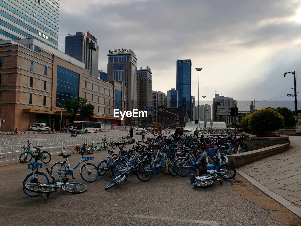 BICYCLES AGAINST BUILDINGS IN CITY