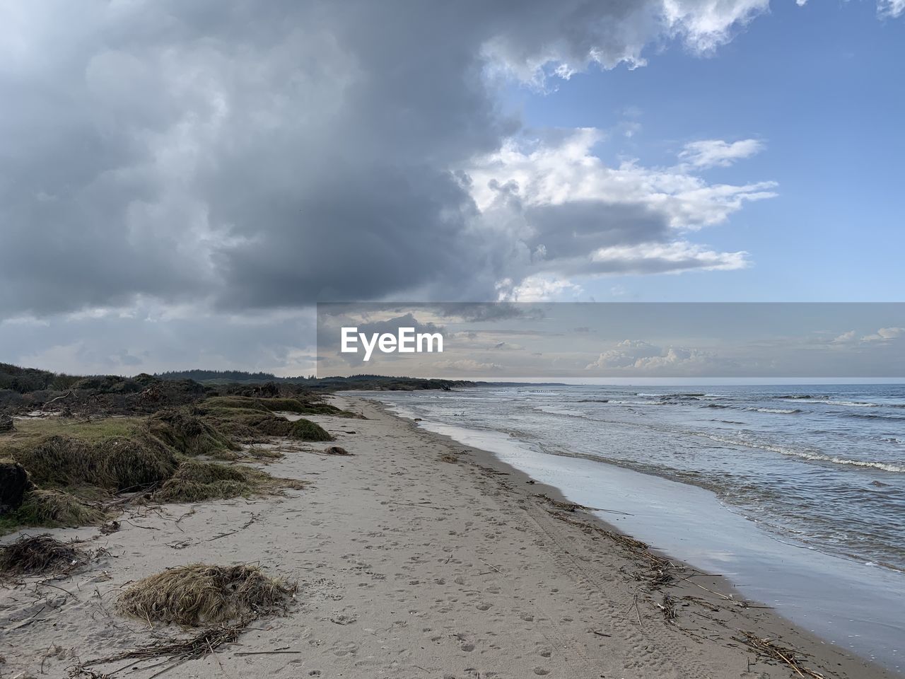 Scenic view of beach against sky