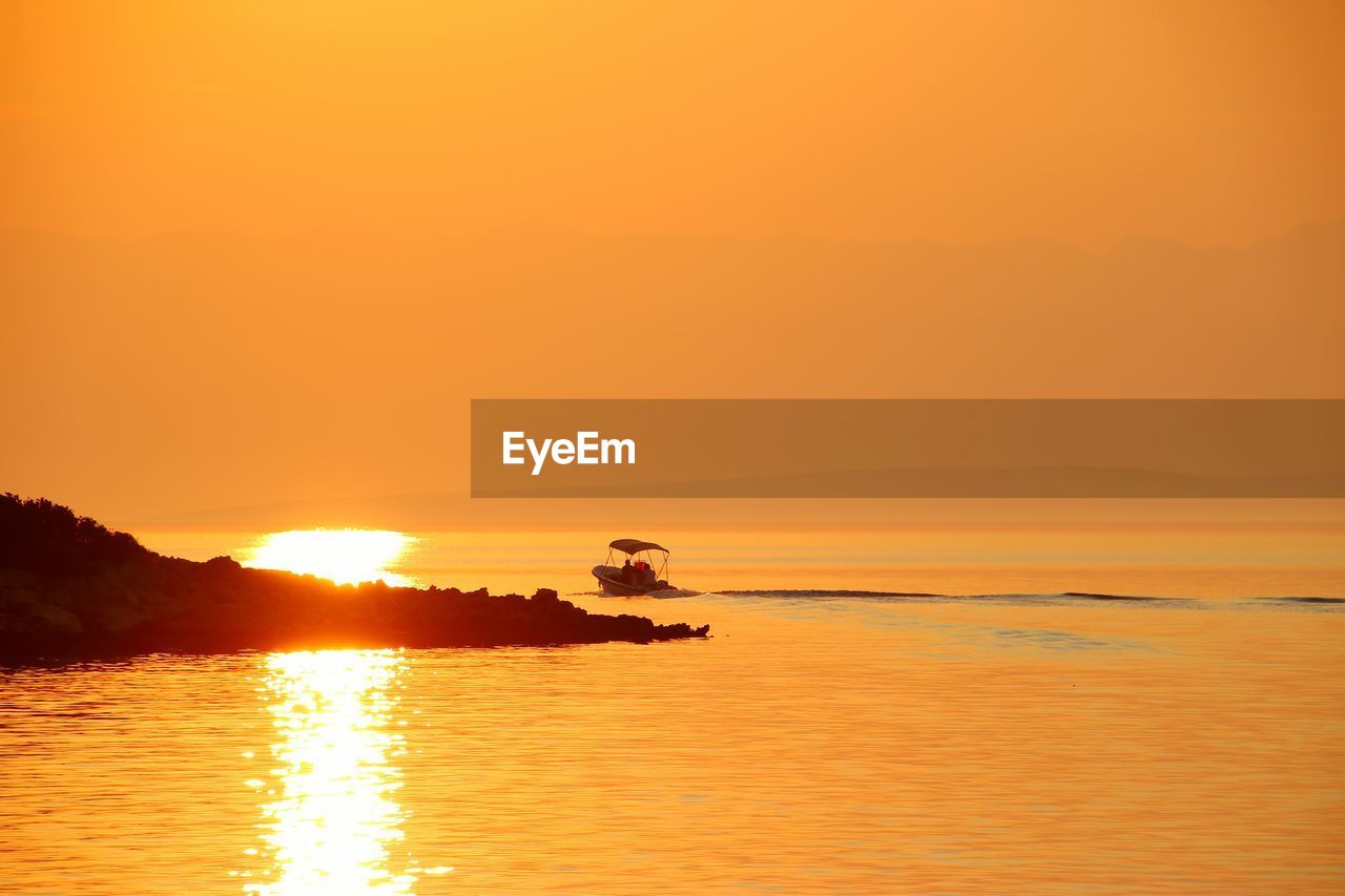 SCENIC VIEW OF SEA AGAINST ROMANTIC SKY