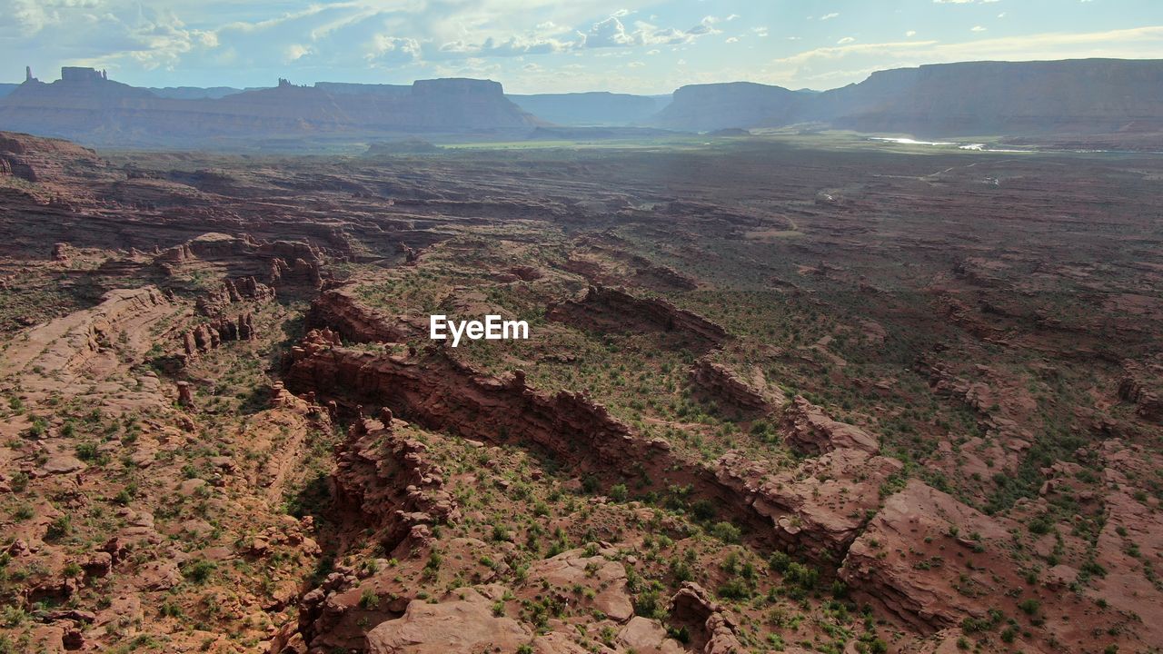 AERIAL VIEW OF LANDSCAPE AND MOUNTAINS