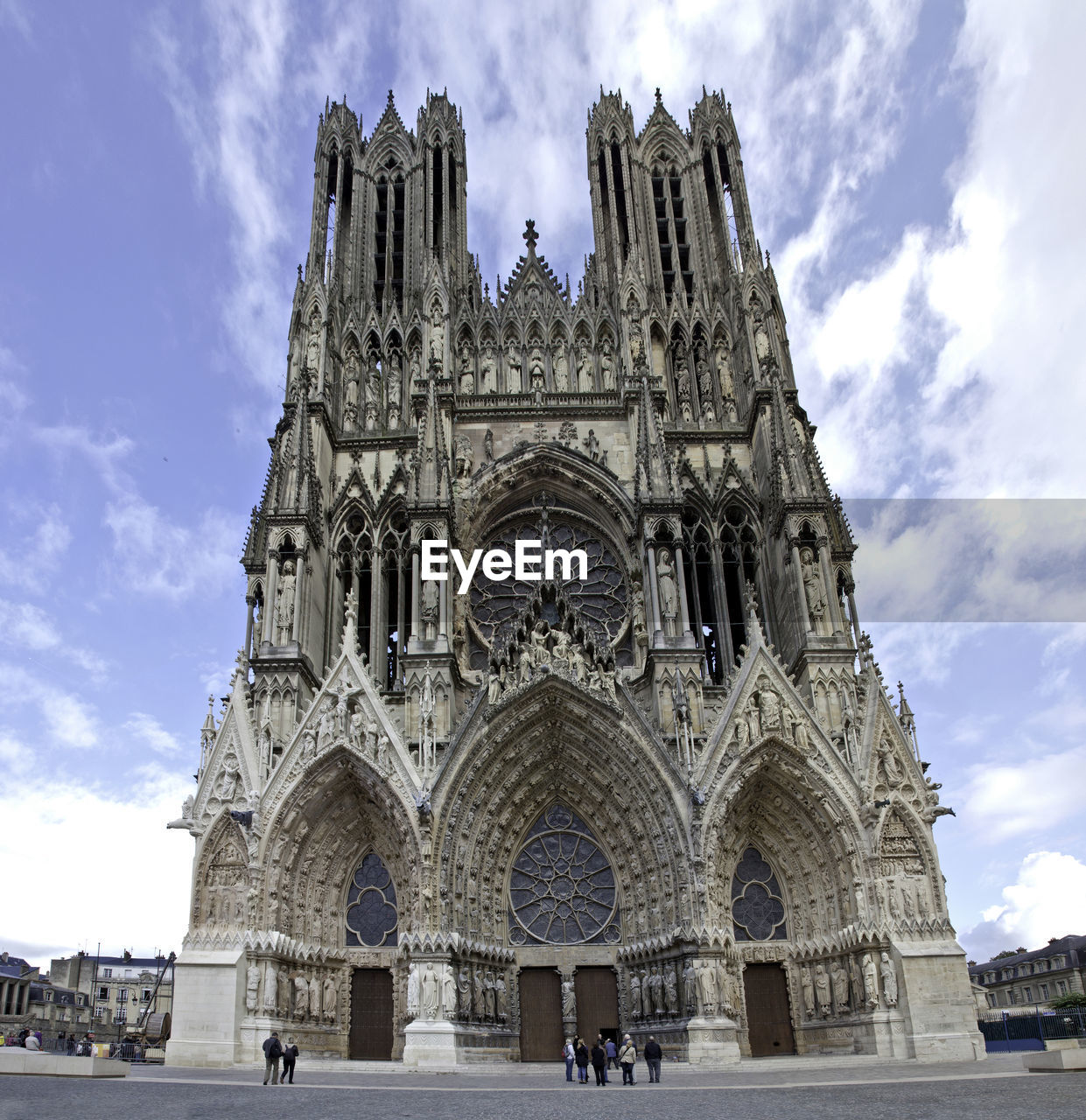 Low angle view of historical building against cloudy sky