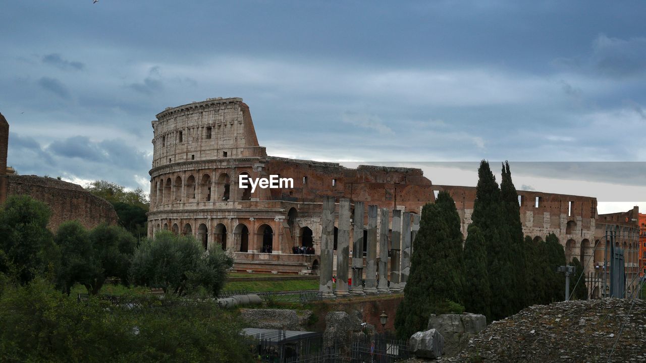 CASTLE AGAINST CLOUDY SKY