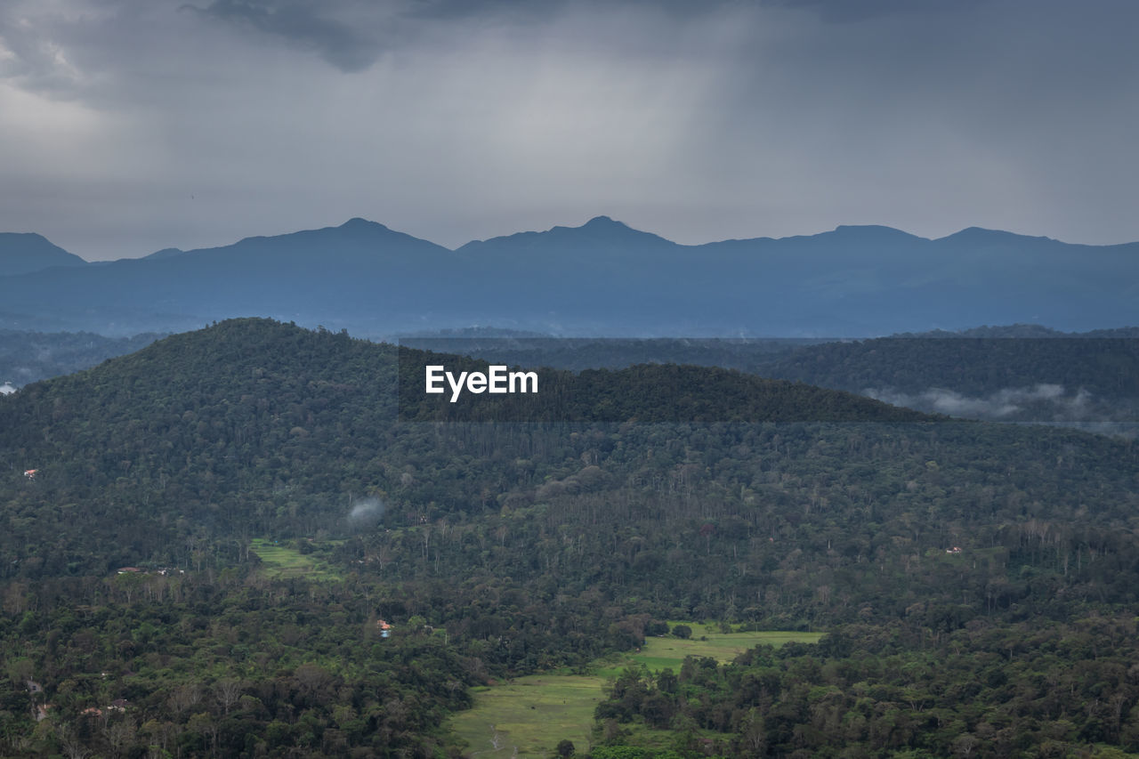 Mountain horizon with dramatic sky at morning from flat angle