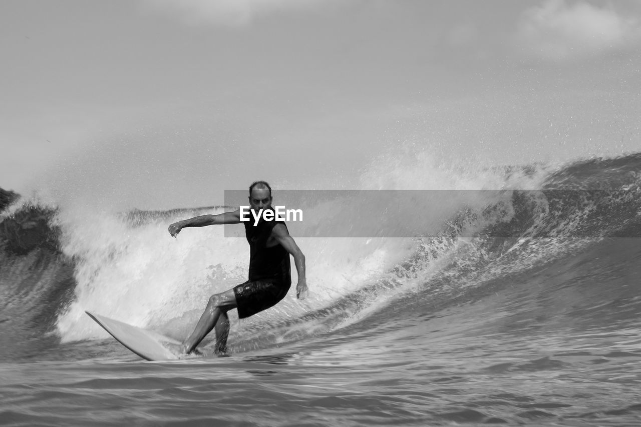 Man surfing in sea