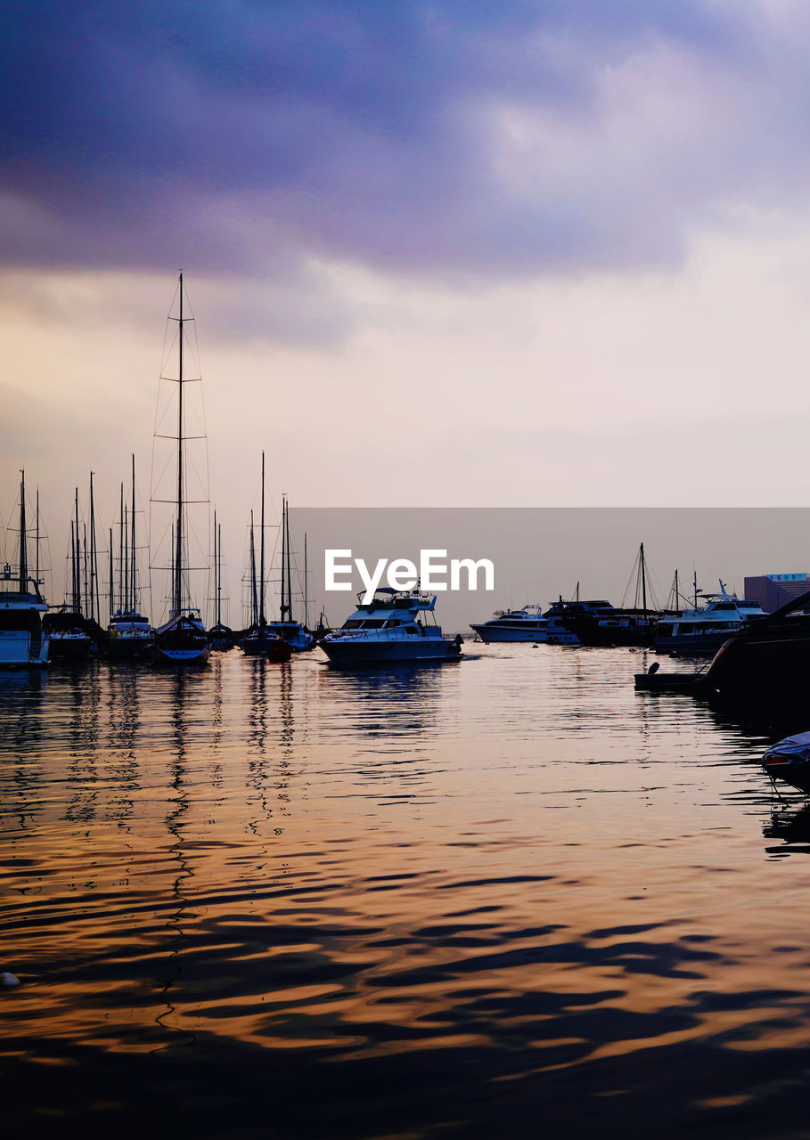 water, nautical vessel, transportation, sky, mode of transportation, sea, reflection, sailboat, cloud, boat, nature, ship, harbor, sunset, vehicle, dusk, evening, dock, beauty in nature, travel, tranquility, no people, travel destinations, moored, sailing, mast, marina, pole, watercraft, bay, tranquil scene, scenics - nature, outdoors, idyllic, holiday, ocean, sailing ship, vacation, horizon, dramatic sky, trip, architecture, tourism, yacht