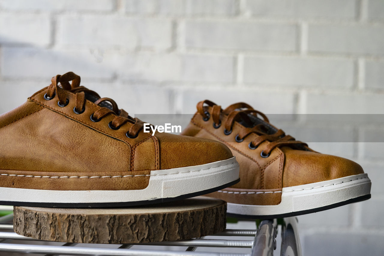 Brown leather sneakers. youth fashion concept.