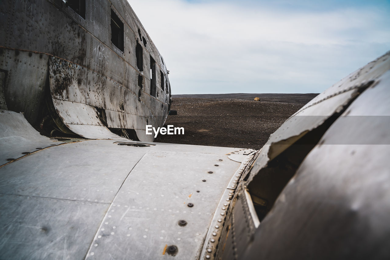 ABANDONED AIRPLANE ON BEACH