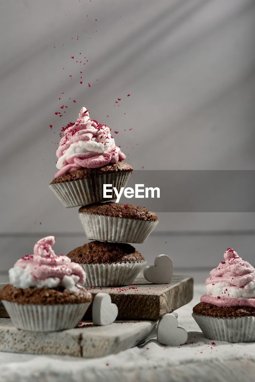 Latvian holiday themed rye and cranberry cupcakes with red sprinkles