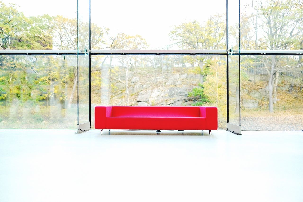 Red sofa waiting for a guest